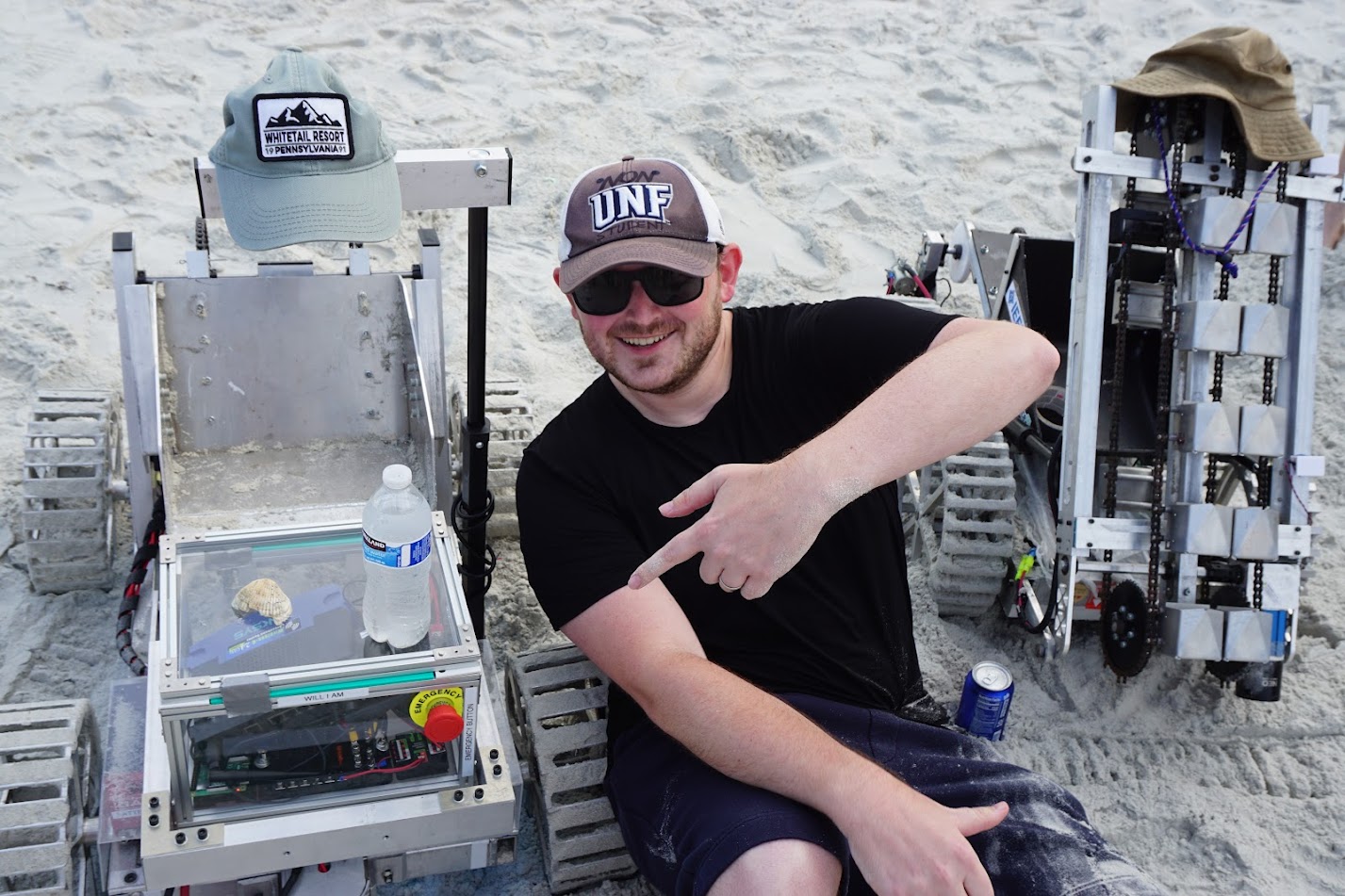2024 Nathan Nye at UNF Osprey Robotics Beach Day 5-25-24 with 2 UNF Robots
